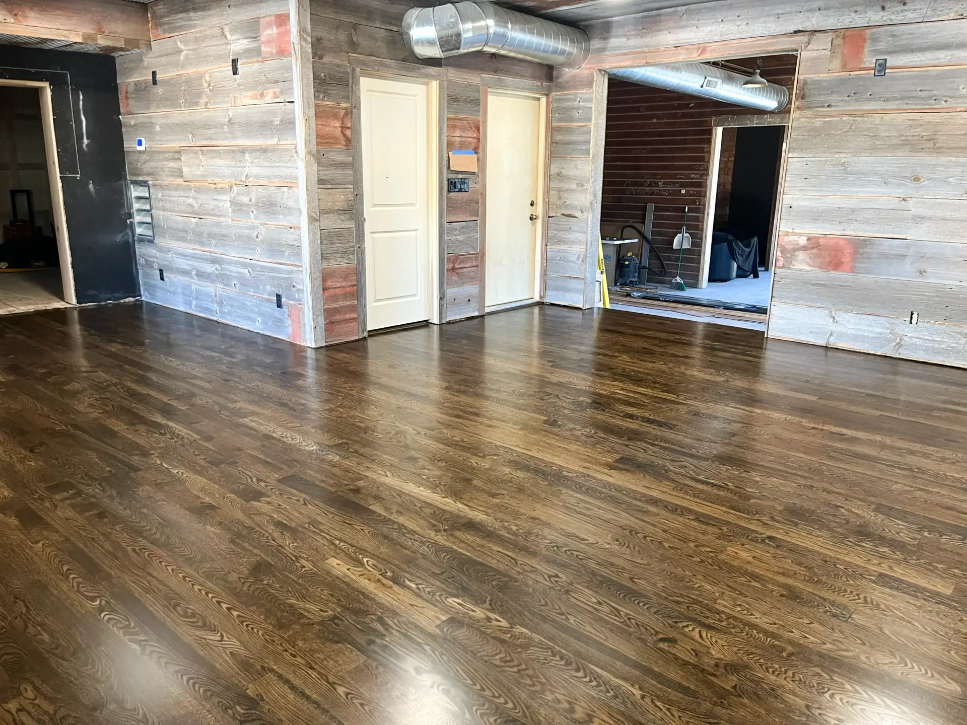 Dallmann Building Bennet NE white oak hardwood installation sand and finish