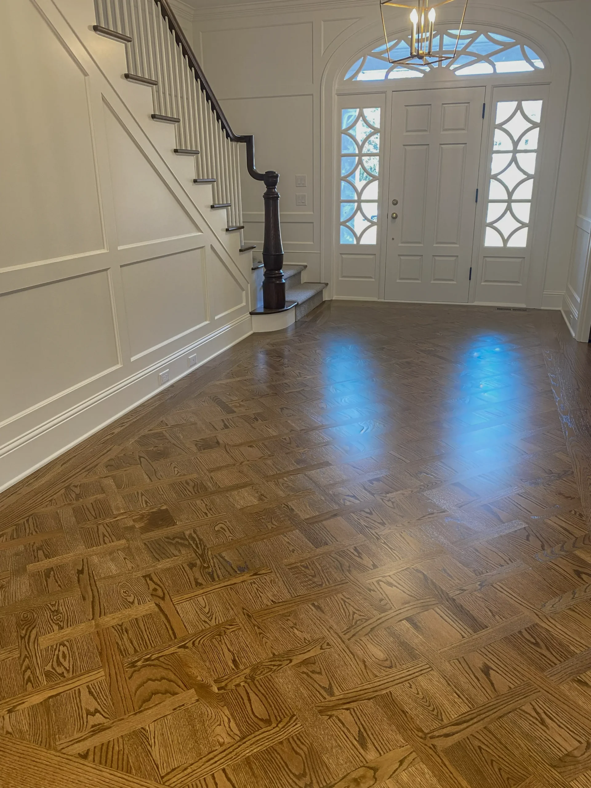 Herringbone red oak hardwood floor feature